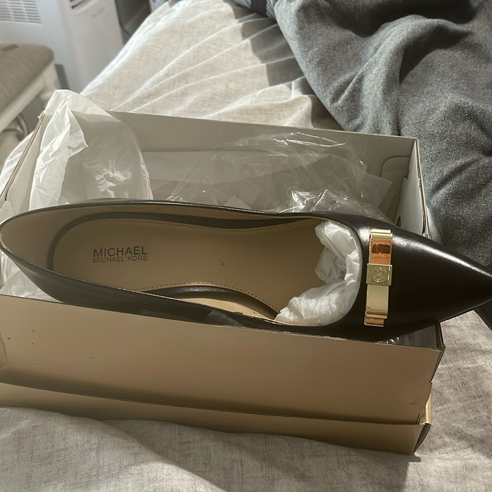 Michael Kors black and gold pumps worn once still in excellent condition